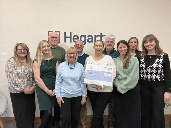 Team members from Hegarty and Wake House celebrate raising 6000 for Bourne Arts Community Trust