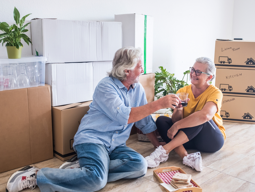 couple sitting in new home
