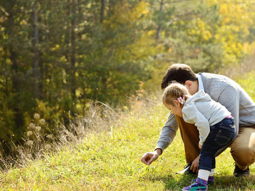 father and daughter in field