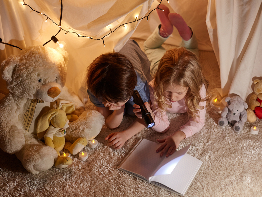 children in blanket fort