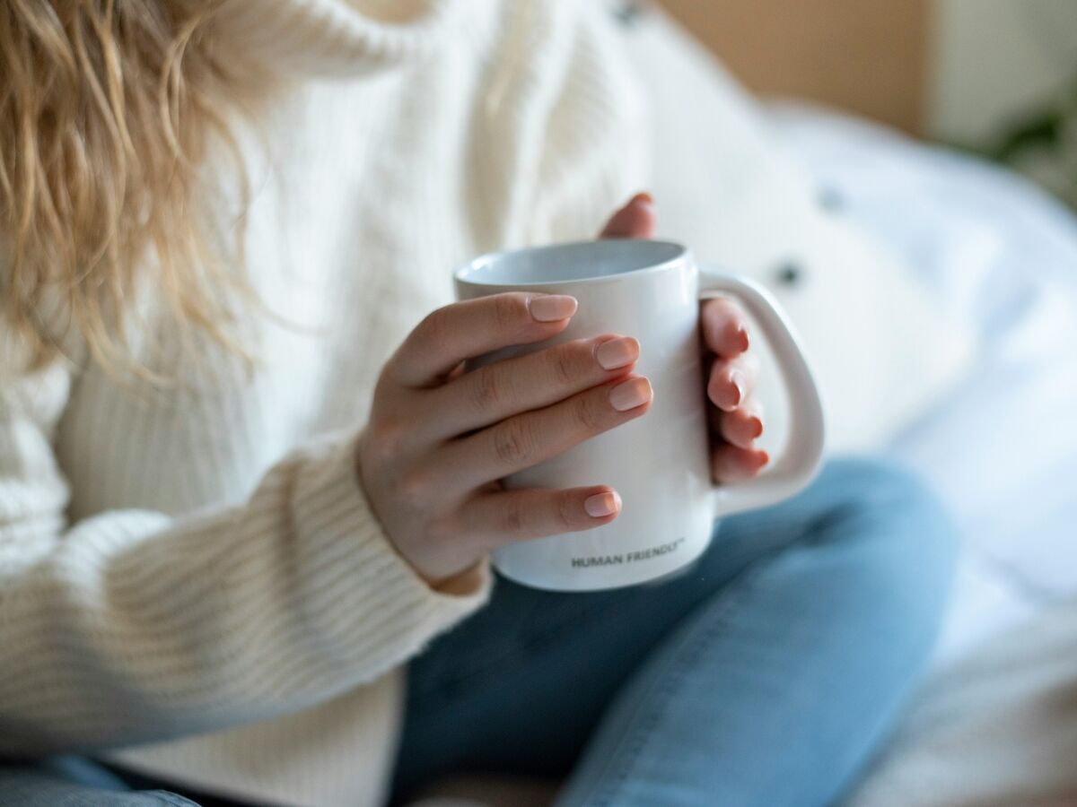 woman holding mug
