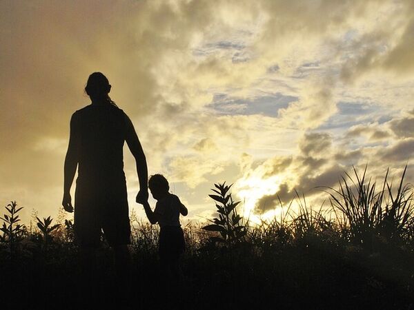 Child and parent silhouette