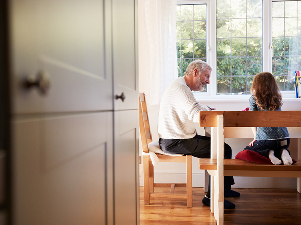 man and child at table