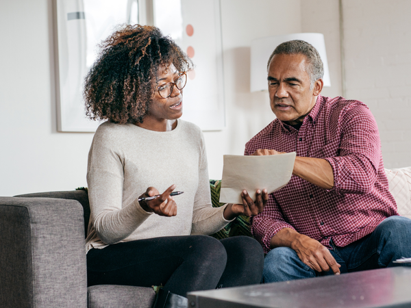 Couple discussing paperwork
