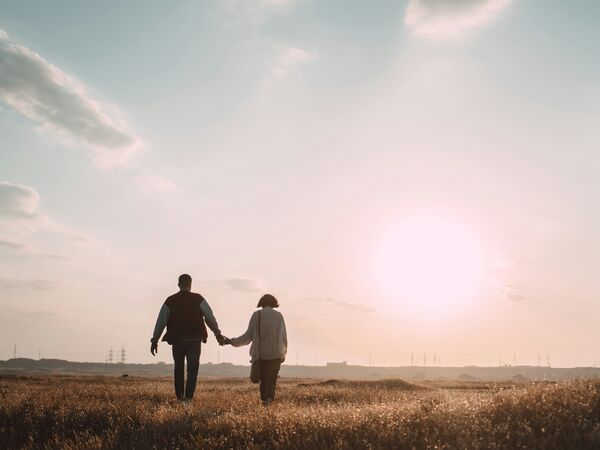 Couple holding hands